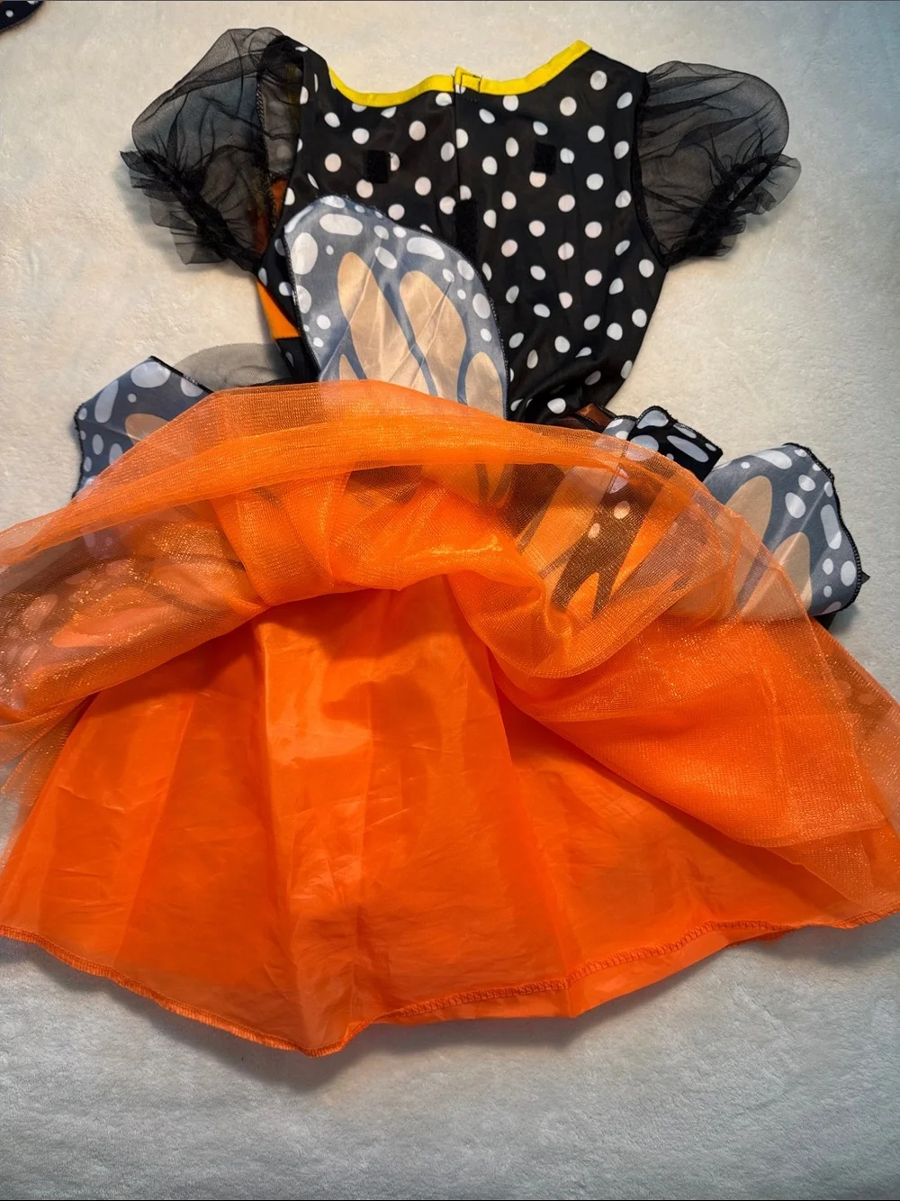 Halloween children’s orange and black monarch butterfly costume. Removable wings
